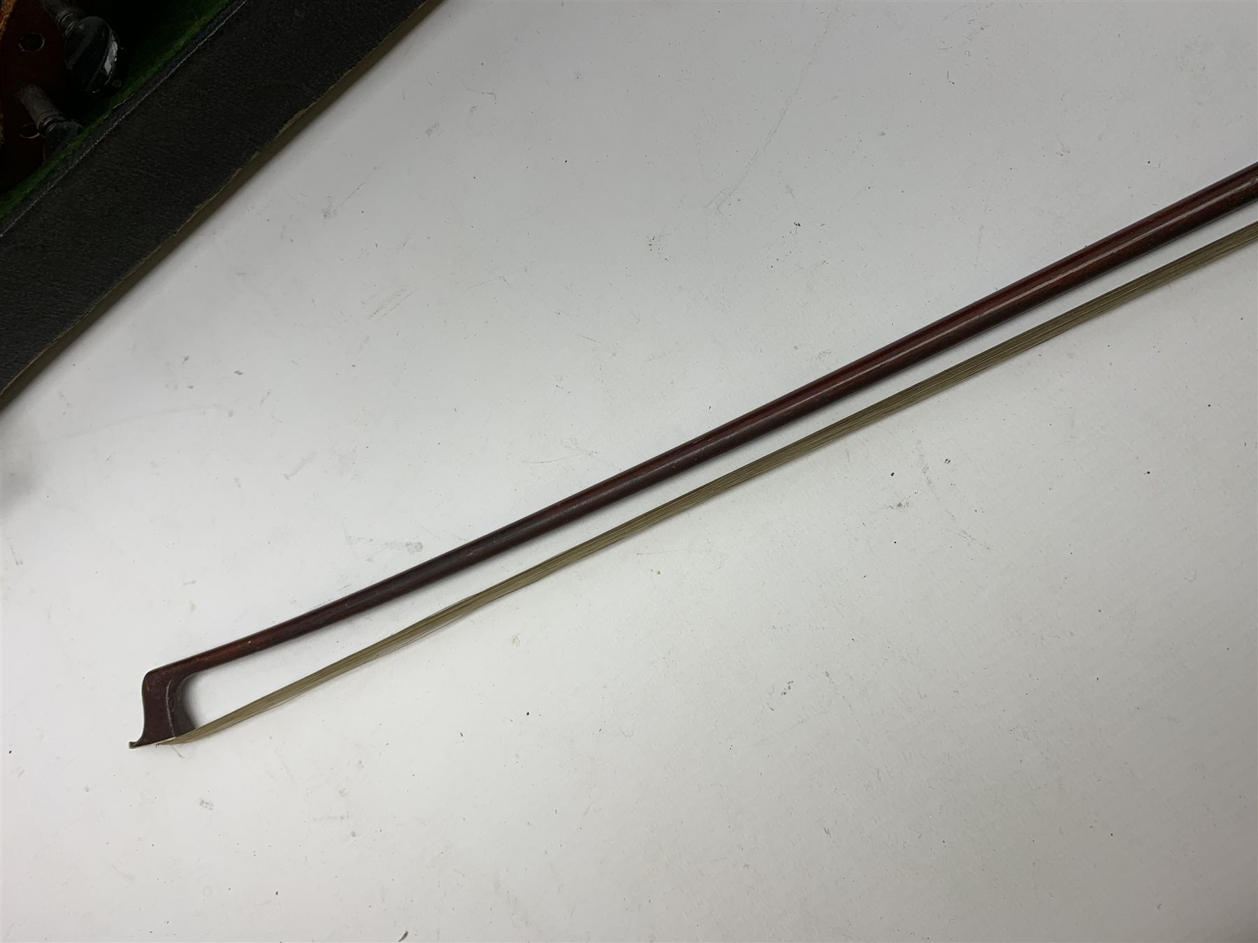 An early 20th century violin, The Maidstone, Murdoch & Co, London, with one piece maple back and spruce top, 60cm long, with bow, and ebonised coffin shaped case. 