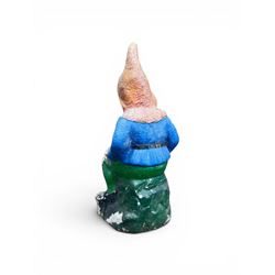 Early large scale composite stone garden gnome, original distressed paint