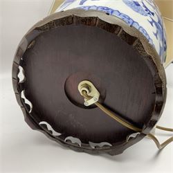 Chinese blue and white table lamp of baluster form, decorated with birds and floral displays, on hardwood base with shade, H78cm