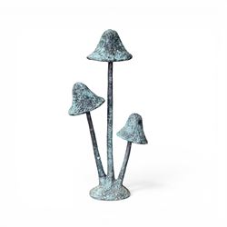 Bronze garden ornament in the form of three mushroom stalks, on naturalistic base