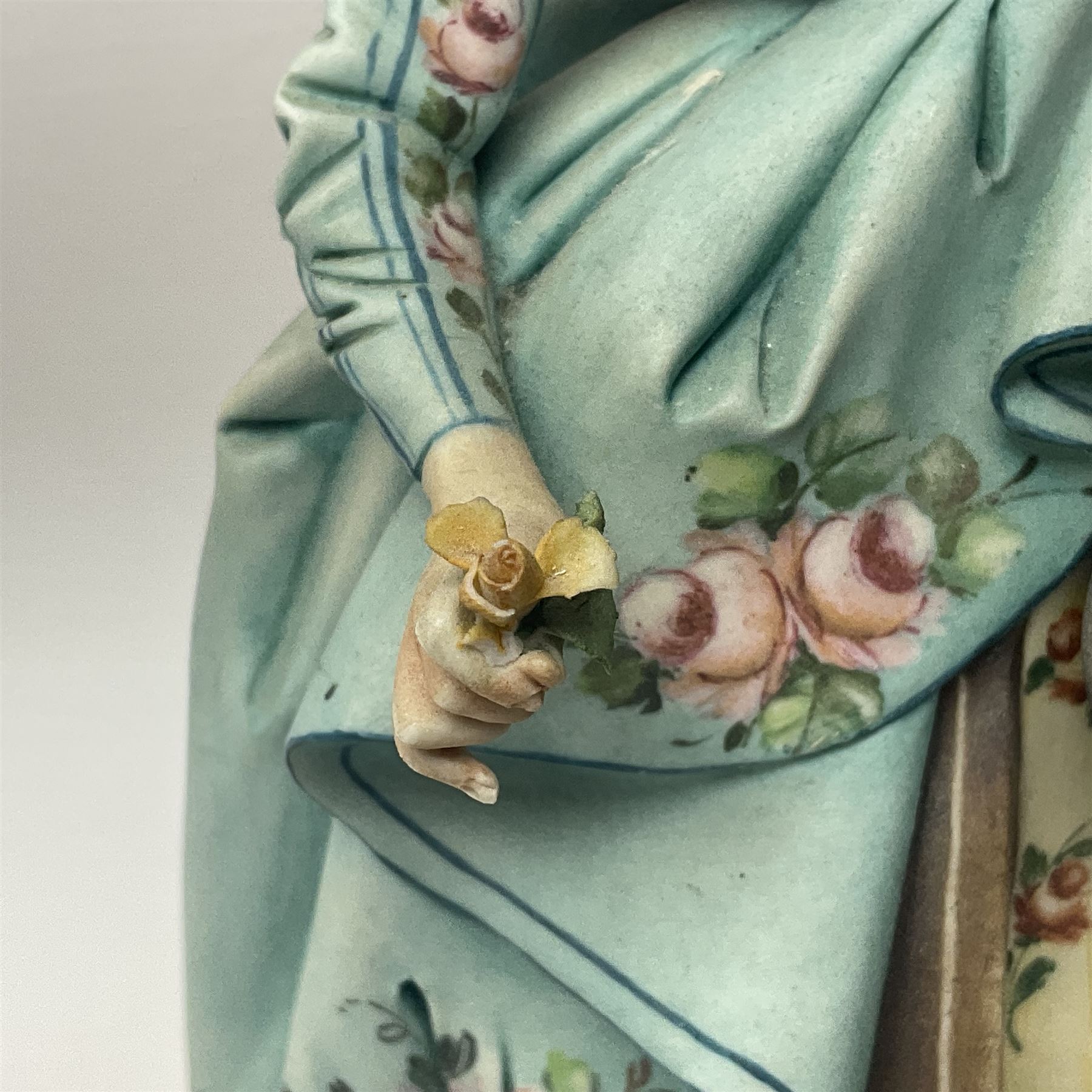 Two Royal Doulton figures, Buttercup HN2309 and Ascot HN2356, together with Capodimonte figure Hussar and His Lady 