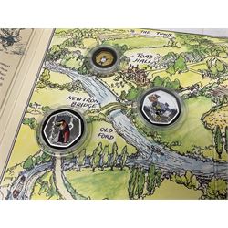 Two Queen Elizabeth II Ascension Island 2021 Wind in the Willows seven coin sets, both with 'Toad's Last Little Song' 24ct gold fifty pence weighing 2.25 grams, includes both layered in pure silver and fine .999 silver fifty pence pieces, housed in a presentation folders with certificates