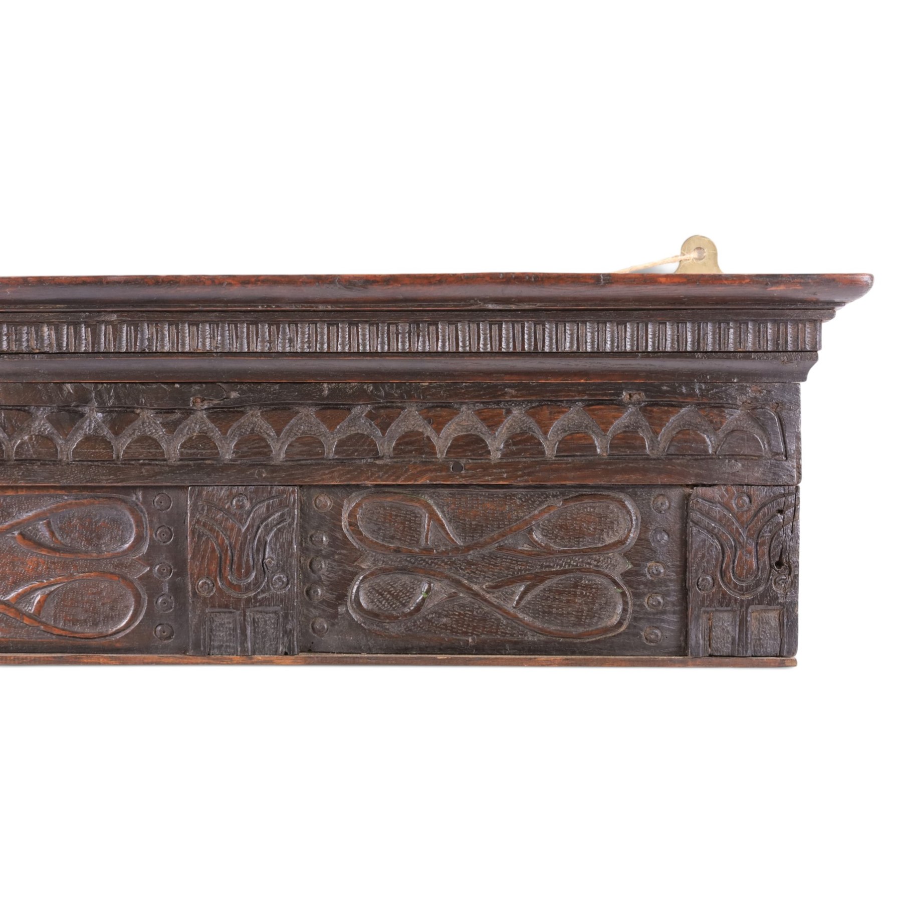 18th century and later carved oak panel, the carved cornice above a repeating boarder and two panels, H25cm, L81cm