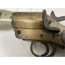 Schermulys Patent No.503324 nitro proof line throwing pistol No.15003; brass body with proof marks; the 32cm steel barrel with secondary handle over and original transfer 'The Schermuly Pistol Rocket Apparatus Ltd. London' L51cm overall