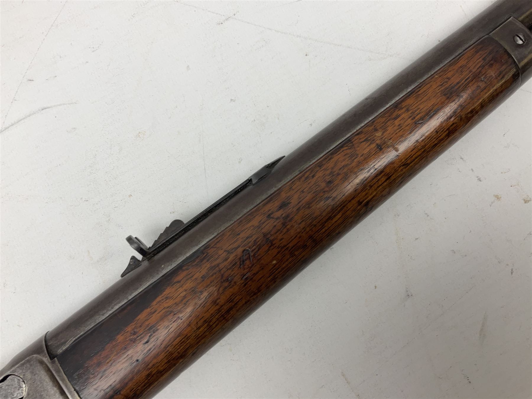 Marlin Firearms Co. USA 'Safety' .32 rim-fire rifle dated 1892, the 61cm barrel with magazine tube under, walnut stock with under lever cocking and crescent butt plate, serial no.153534, L103.5cm