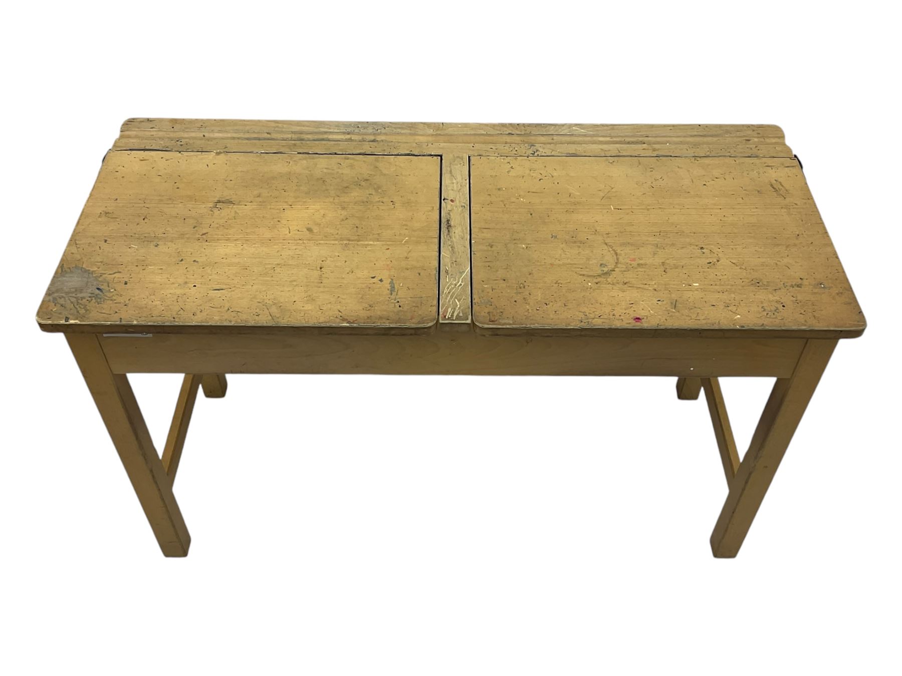 Mid-20th century beechwood school desk, rectangular lift-top desk with storage compartment, supported by square legs with cross stretchers; four matching beech chairs (5)
