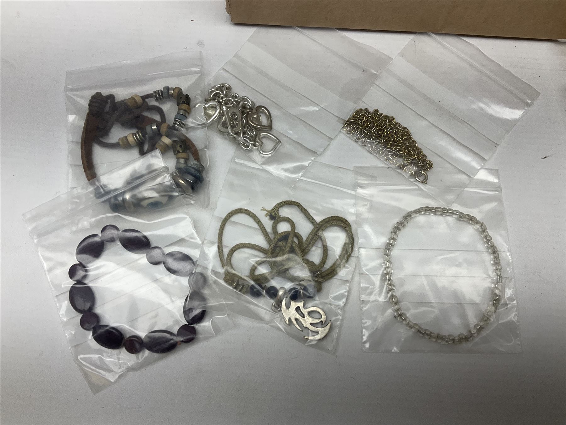 Silver necklace, compact mirror with lipstick holder and a collection of costume jewellery 