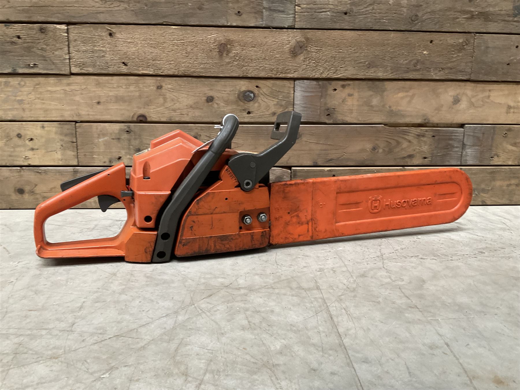 Husqvarna 141 petrol chainsaw and a Husqvarna 226HD75S petrol hedge cutter