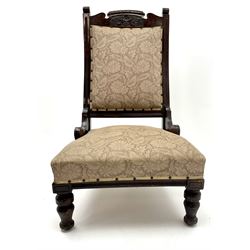 Victorian mahogany framed nursing chair, shaped and carved cresting rail, upholstered back and seat, turned supports 