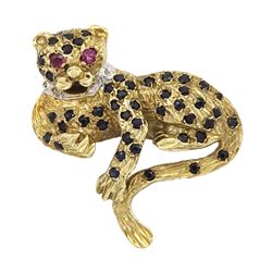9ct gold sapphire cheetah brooch, with ruby eyes and a diamond set collar, Birmingham 1989