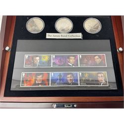 Danbury Mint 'The Ultimate James Bond Collection' comprising stamps and coins housed in a display case, 'Concorde Queen of the Skies' sculpture, stamps, medallion display and 2020 'Centenary of the Unknown Warrior' five pound coin cover in Harrington and Byrne folder