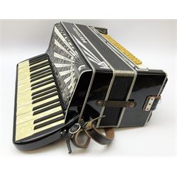 Italian Mantovani piano accordion with Art Deco style black and white case, twenty-four keys and one-hundred and twenty buttons L52cm in carrying case