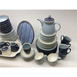 Denby tea and dinner wares, in tones of blue, comprising seven dinner plates, seven salad plates, eight side plates, six bowls, eight smaller bowls, and seven further smaller bowls, two large serving plates, one serving dish, one large bowl, and two smaller, seven mugs, eight tea cups and seven saucers, teapot, large jug, two smaller, and sucrier and cover. 
