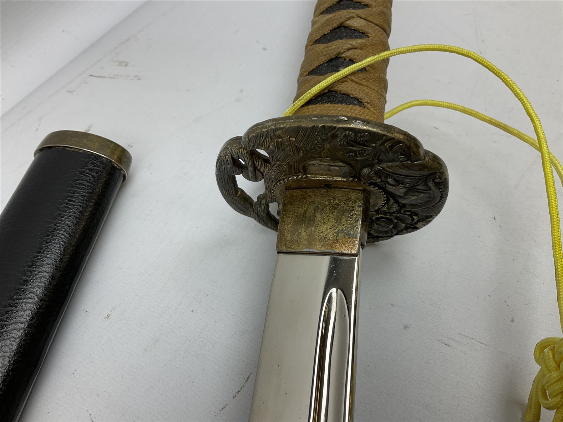 Three reproduction swords - Japanese katana and saya; Tai Chi sword with ornate scabbard; and dress sword with fullered triangular blade and horn handle (3)