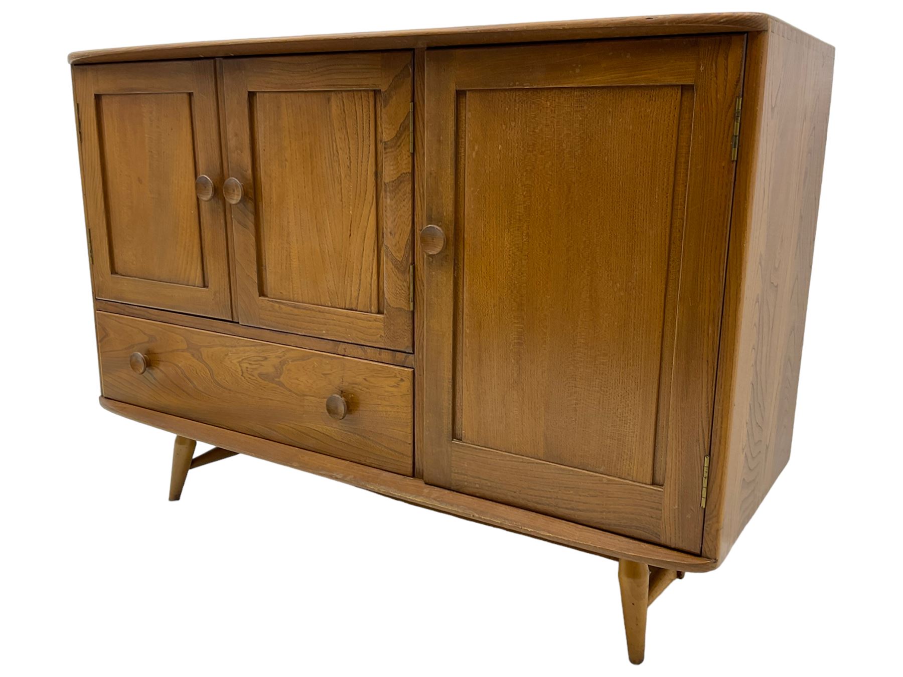 Ercol - elm and beech sideboard, fitted with cupboards and single drawer, enclosed by panelled doors, on splayed tapering feet