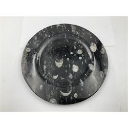 Pair of circular plates and oblong platter, each with Orthoceras and Goniatites inclusions, platter L30cm, plates D25cm