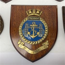 Six Naval wall shields, including HMS President, Vanguard, HMS Kilmorey etc, and another plaque 