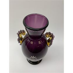 19th century Mary Gregory style amethyst glass vase, of ovoid form with twin amethyst and amber glass flying handles, decorated in white enamel with classical figural scene, H24cm