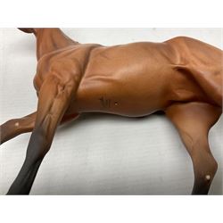 Collection of Beswick horse figures, to include Red Rum on a wooden plinth,  Lammtarra on oval plinth, Morgan Horse Black and three others, together with Royal Daulton Appaloosa Foal and a USSR horse