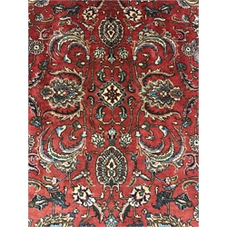 Persian Tabriz red ground carpet, central medallion, repeating border, 355cm x 270cm