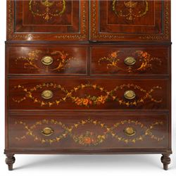 19th century French Louis XVI design mahogany and polychrome painted gentleman's press wardrobe - projecting cavetto cornice with urn and bellflower painted frieze, the twin doors with classical figural medallions surmounted by urns and festoon decoration with scrolling acanthus leaves, enclosing five sliding trays, the base fitted with two short over three long cock-beaded drawers, the facias painted with interlocking swags and garlands of bouquets with recumbent lion brass handle-plates, lower reeded edge on turned feet