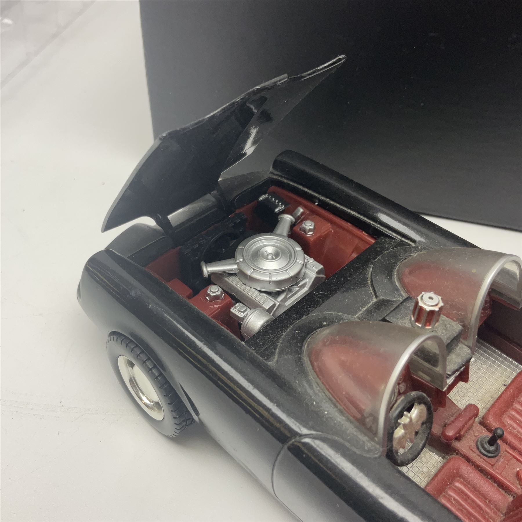 Two Corgi DC Comics die-cast Batmobiles comprising 1:18 scale die-cast Limited Edition Pre-Production Raw Metal Casting 1940 Batmobile Roadster no. 184/300, and 1:24 scale die-cast Limited Edition Raw Metal Casting 1960 Batmobile no. 858/1000, both with original boxes and certificates of authenticity 