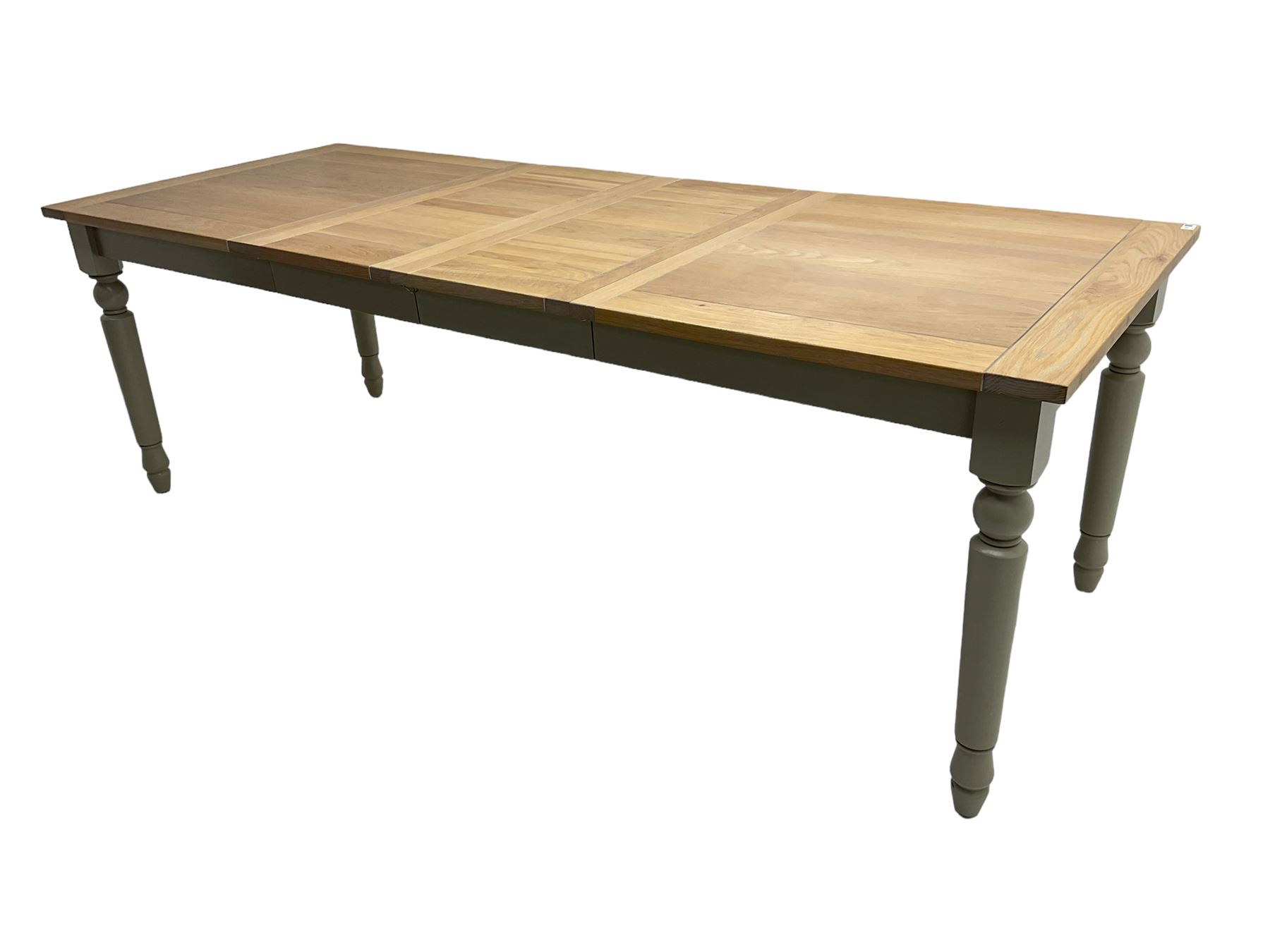 Neptune Furniture - 'Suffolk' oak dining table, pull-out extending top with two additional leaves, on turned supports, in grey paint and wax finish 