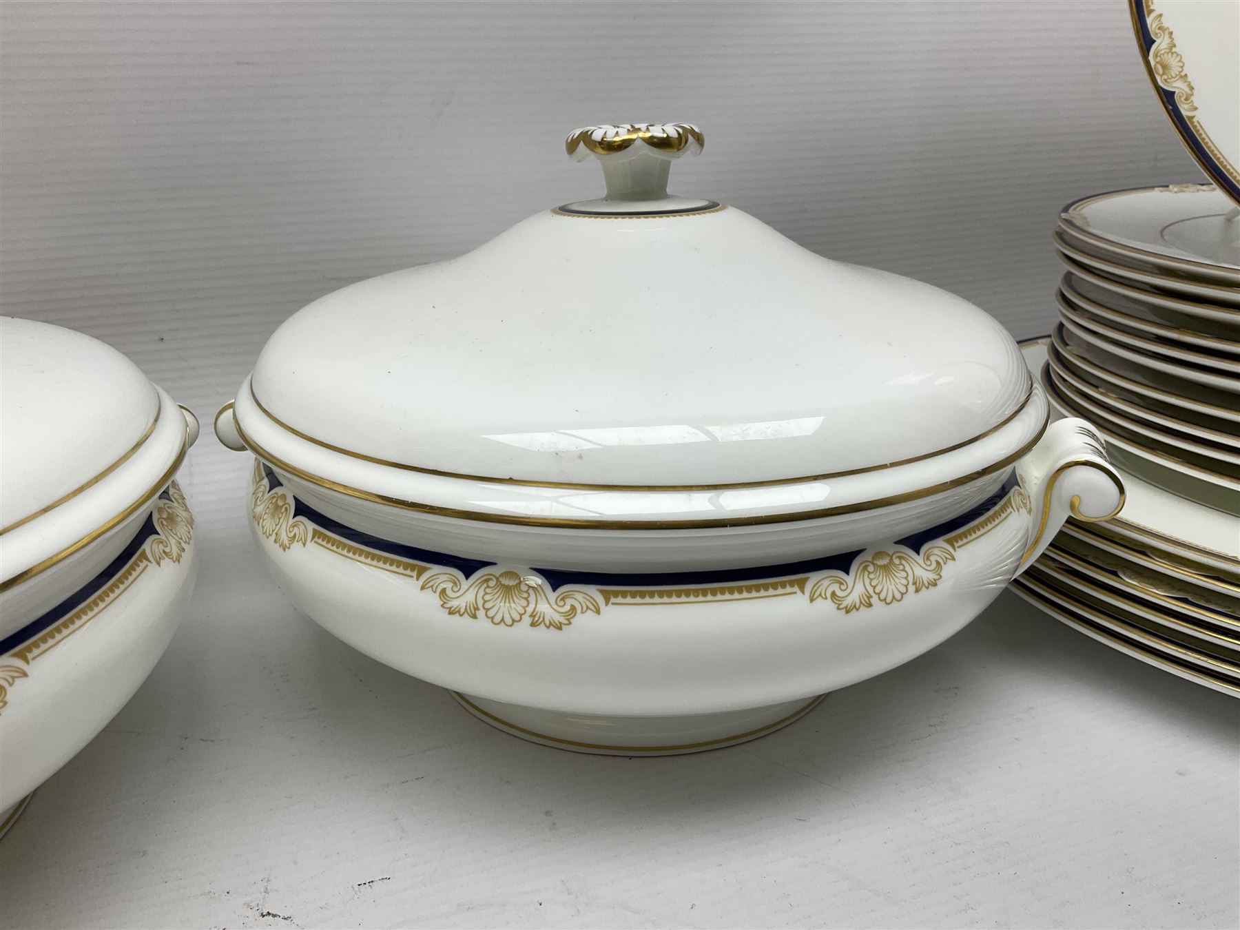 Wedgwood Cavendish pattern dinner service for twelve, comprising dinner plates, side plates, bowls, soup bowls, two tureens, saucer boat and sauce, together with matching part coffee service (82) 