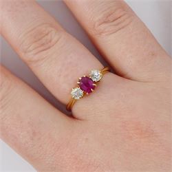 Victorian 18ct gold ruby and diamond three stone ring, single oval cut ruby of approx 0.45 carat, with a single old cut diamond set either side, Birmingham 1898, total diamond weight approx 0.35 carat