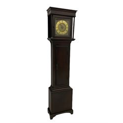 A mid-18th century 30-hour provincial longcase clock by John Darke of Holdsworthy (Devon), in an oak case with a flat-topped pediment, square hood door flanked by two free standing pillars with brass capitals, trunk with a flat-topped full-length door on a rectangular plinth with applied shaped skirting, a 9-1/2” square brass dial with a matted centre and brass (unsilvered) chapter ring, engraved with roman numerals, half and quarter hour divisions, single steel hand and 