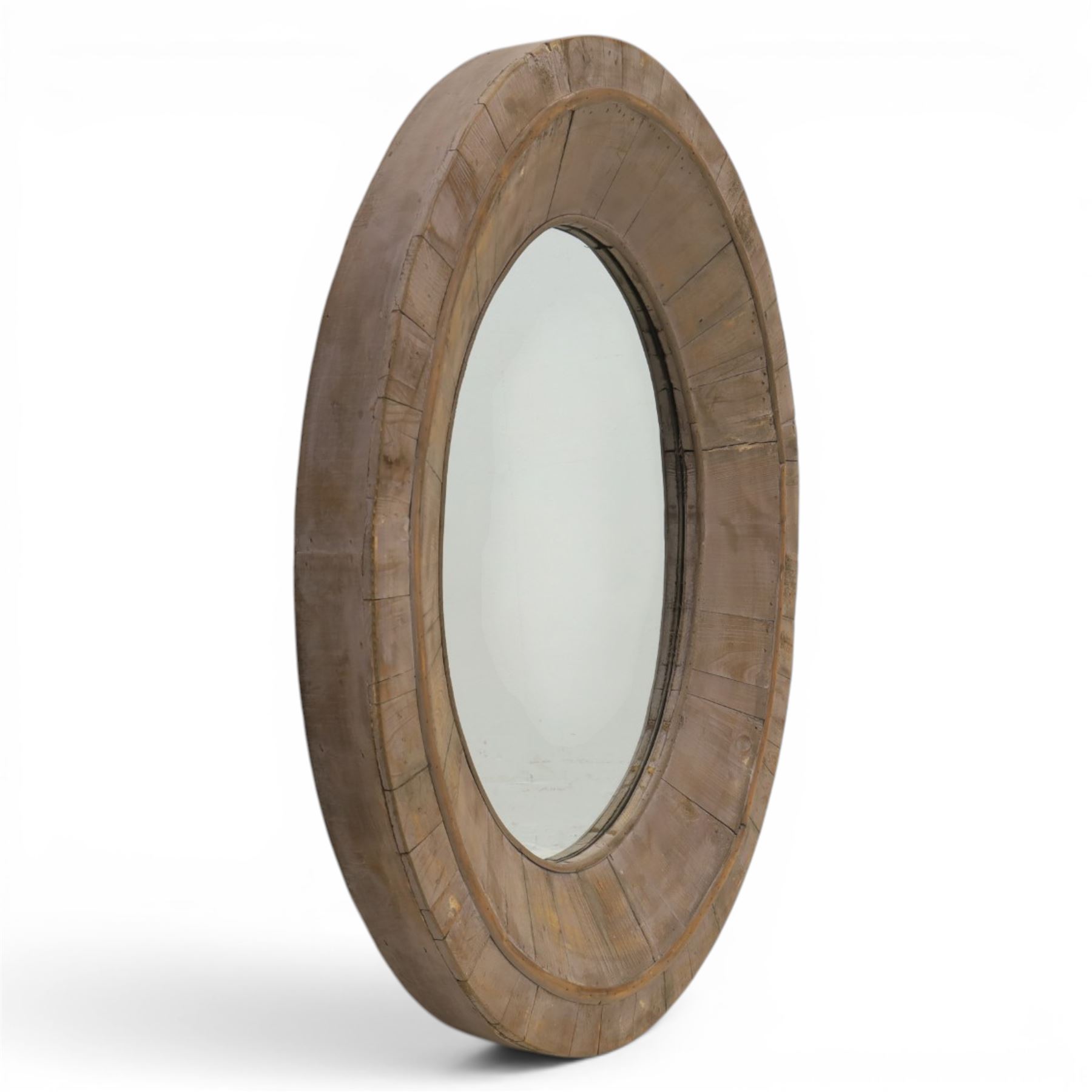 Rusticated driftwood wall mirror, of oval form, the mirror plate within a panelled driftwood frame, overall H83cm W70cm