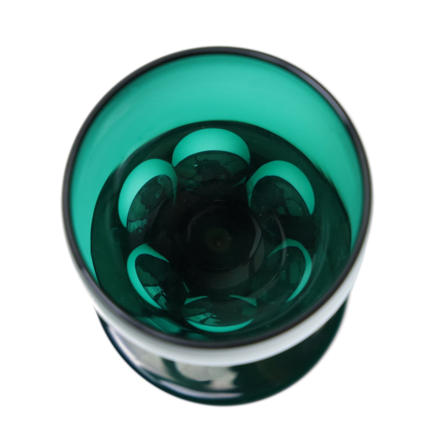 Five green wine glasses of early 19th century design with conical bowls and double knop stems on a circular foot, with pontil marks, pair of green wine glasses with chamfered stems together with an Asprey catalogue of green glass 1740-1840 and two pieces of glass fruit and leaves