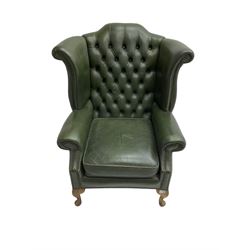 Georgian design wingback armchair, upholstered in buttoned green leather with stud work detail, on cabriole feet
