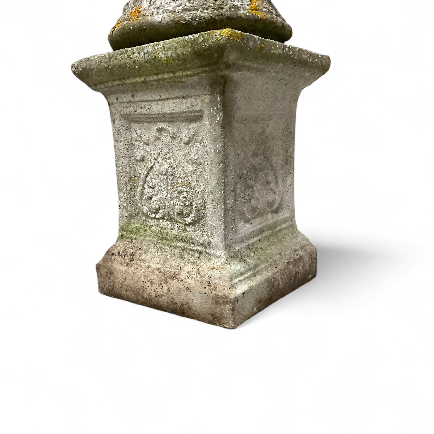 Pair of cast stone ornate garden urns, on plinth bases