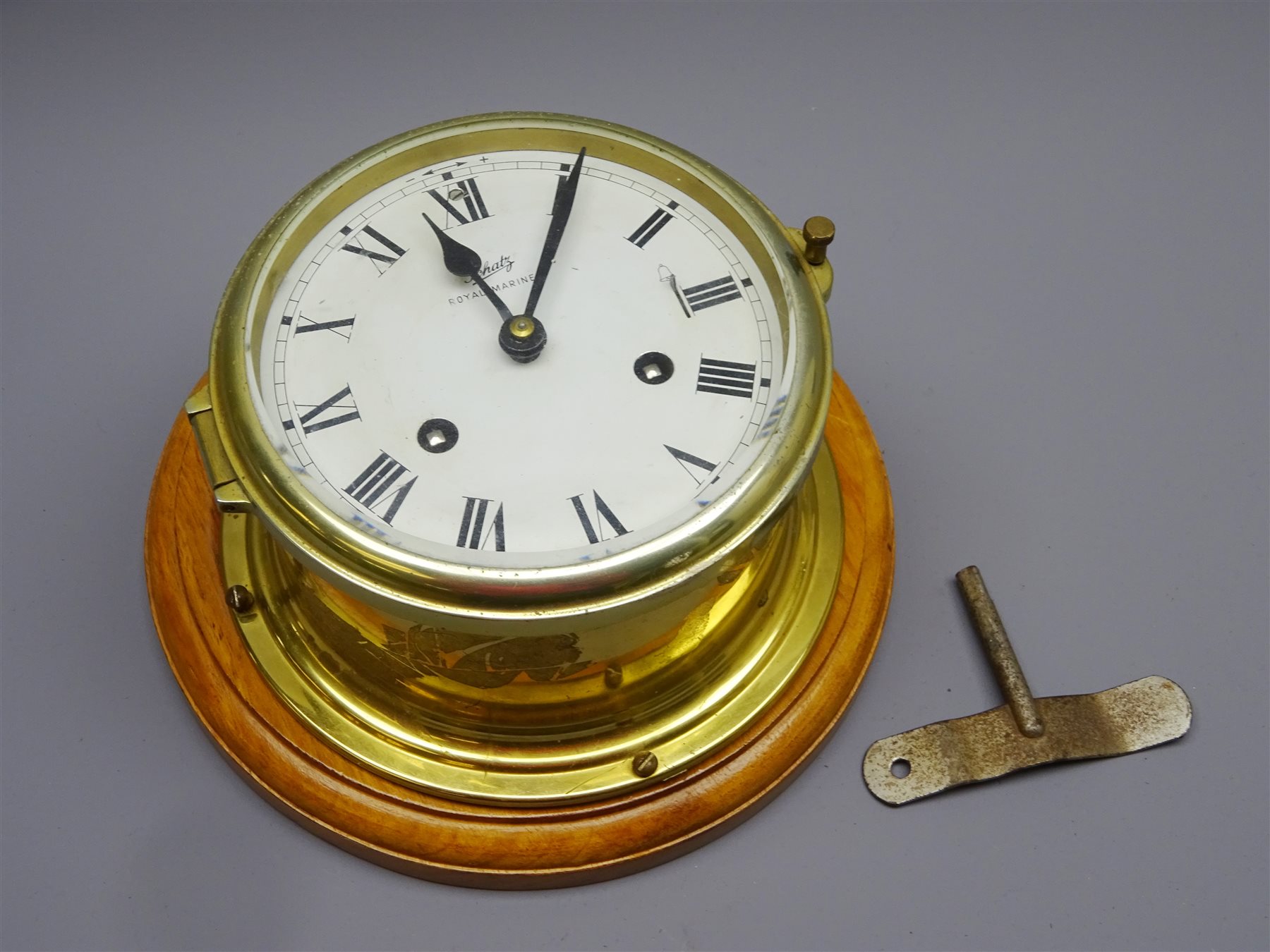 Schatz Royal Mariner brass cased bulkhead type clock, twin train