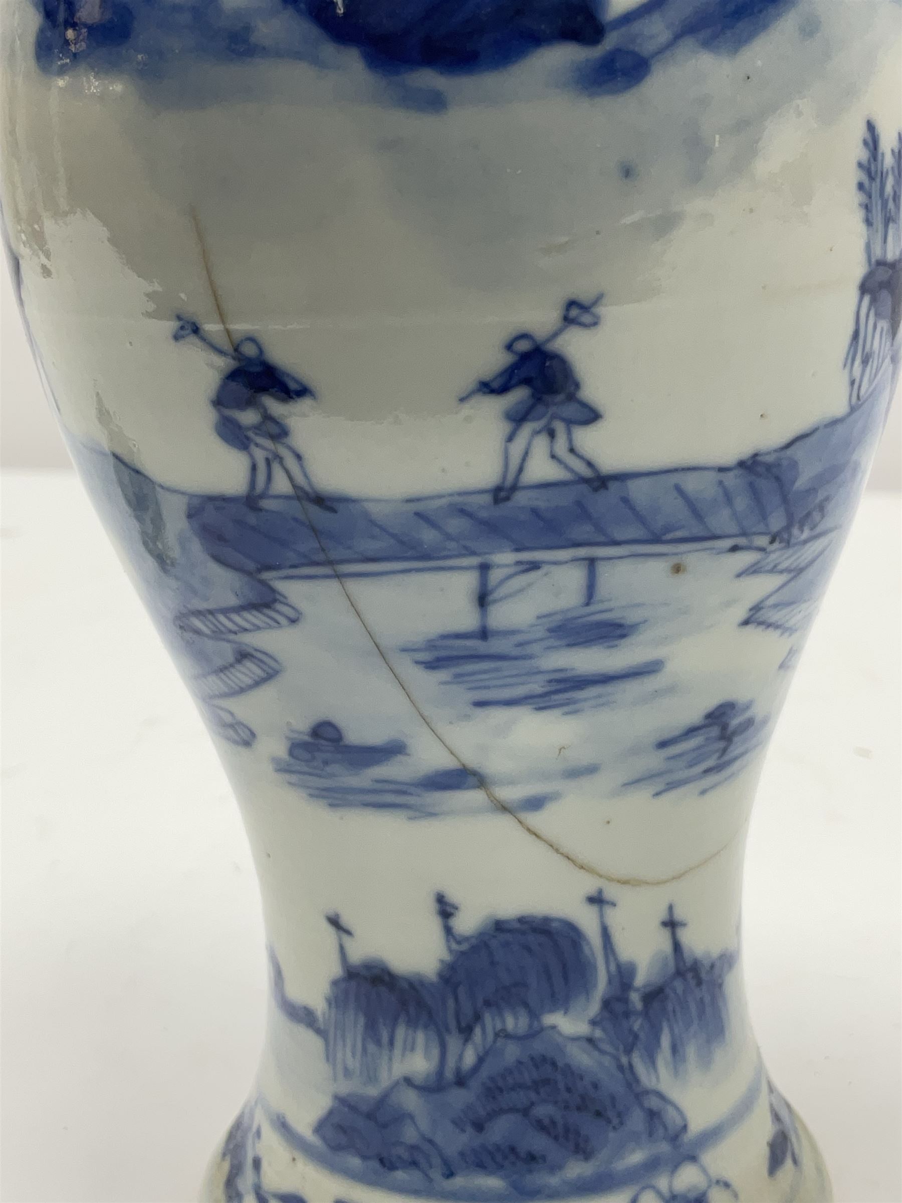 19th century Chinese Kangxi style blue and white jar and cover, decorated with figural and landscape scenes, the domed cover with foo dog finial, with four character marks beneath, H22cm