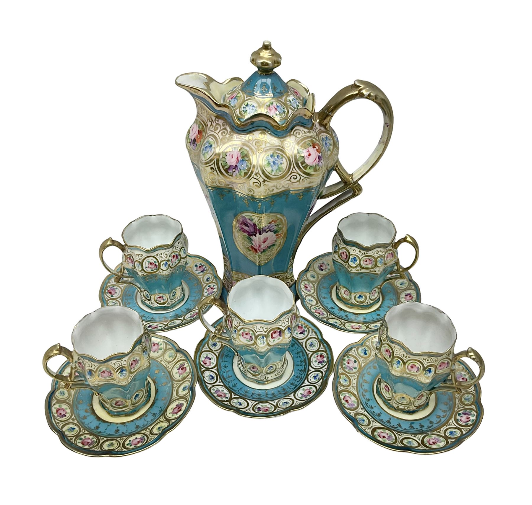 Noritake coffee service, hand painted with roses and gilt detail on a blue ground, comrosing coffee pot, five cups and saucers