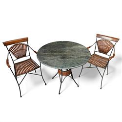 Contemporary circular green marble bistro table, raised on a black metal tubular base with...