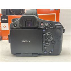 Sony Alpha A700 camera body, serial no 2340937, Sony Alpha A77 camera body, serial no 0715406, together with Sony angle finder and two firm holding grips, all with original boxes  
