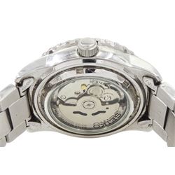 Seiko 5 Sports gentleman's stainless steel automatic wristwatch, Ref. 7S36-04N0, black dial with gilt baton hour markers and one other Seiko 5 Sports, Ref. 7S36-04X0, with grey dial and baton hour markers, both with day-date apertures and exhibition back cases, one boxed