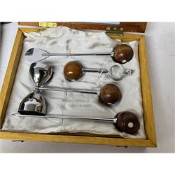 1940's bar tools in a wooden case, together with to vases and a framed picture