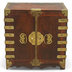Late 20th-century brass-bound Korean bandaji chest, in stained hardwood, hinged front door...