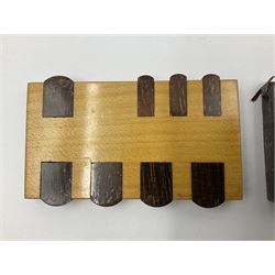 Edwardian silver mounted playing card case, hallmarked William Harrison Walter, Birmingham 1903, the sides each with a period playing card set behind a bevelled glass panel, the hinged cover with later engraving 'Presented to Norman T Crombie Esq by the officers & men of the 31st WR Detachment for services rendered 1917-1918', with red leather lined interior, the three compartments upon a sprung base and containing two later wooden Whist markers, case H12.5cm