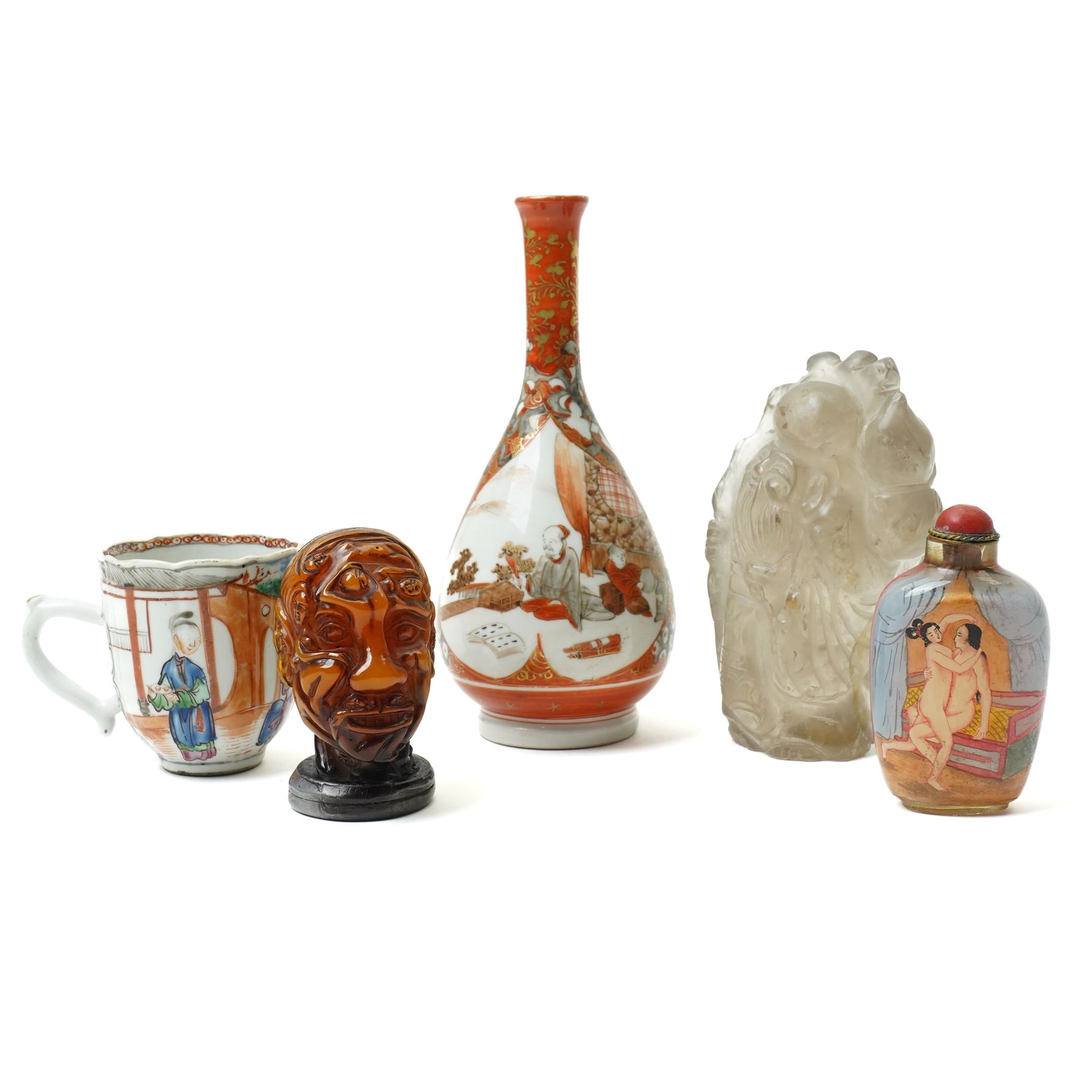Chinese rock crystal figure of a deity with peaches, H12cm, a Japanese Shunga erotically carved seal, H7cm, an erotically painted Chinese scent bottle, H8cm, Japanese satsuma vase, H16cm and a Chinese famille vert teacup, H6.5cm(5)
