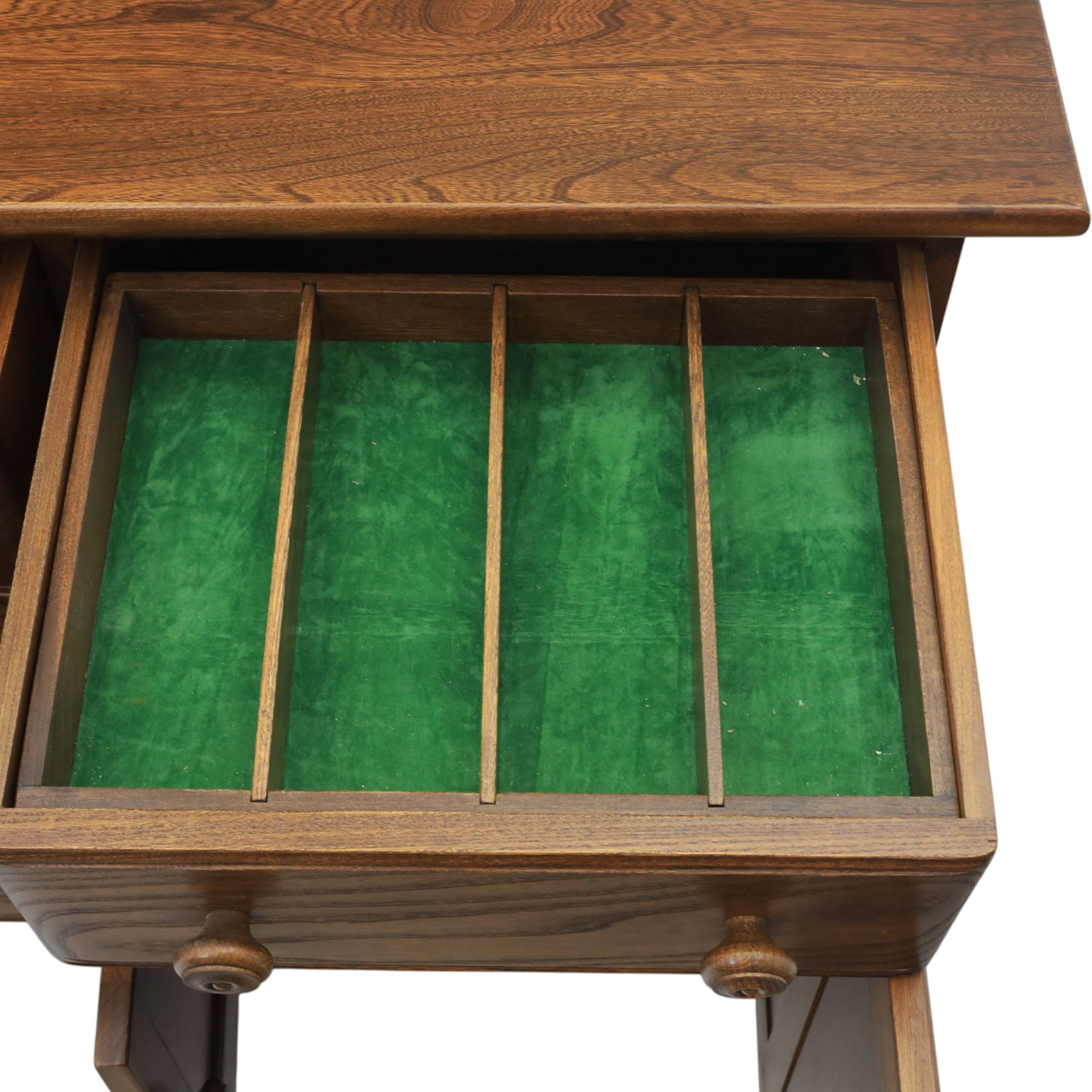 Ercol - elm dresser sideboard, fitted with four drawers and four cupboards with carved detail, drawer featuring cutlery slide