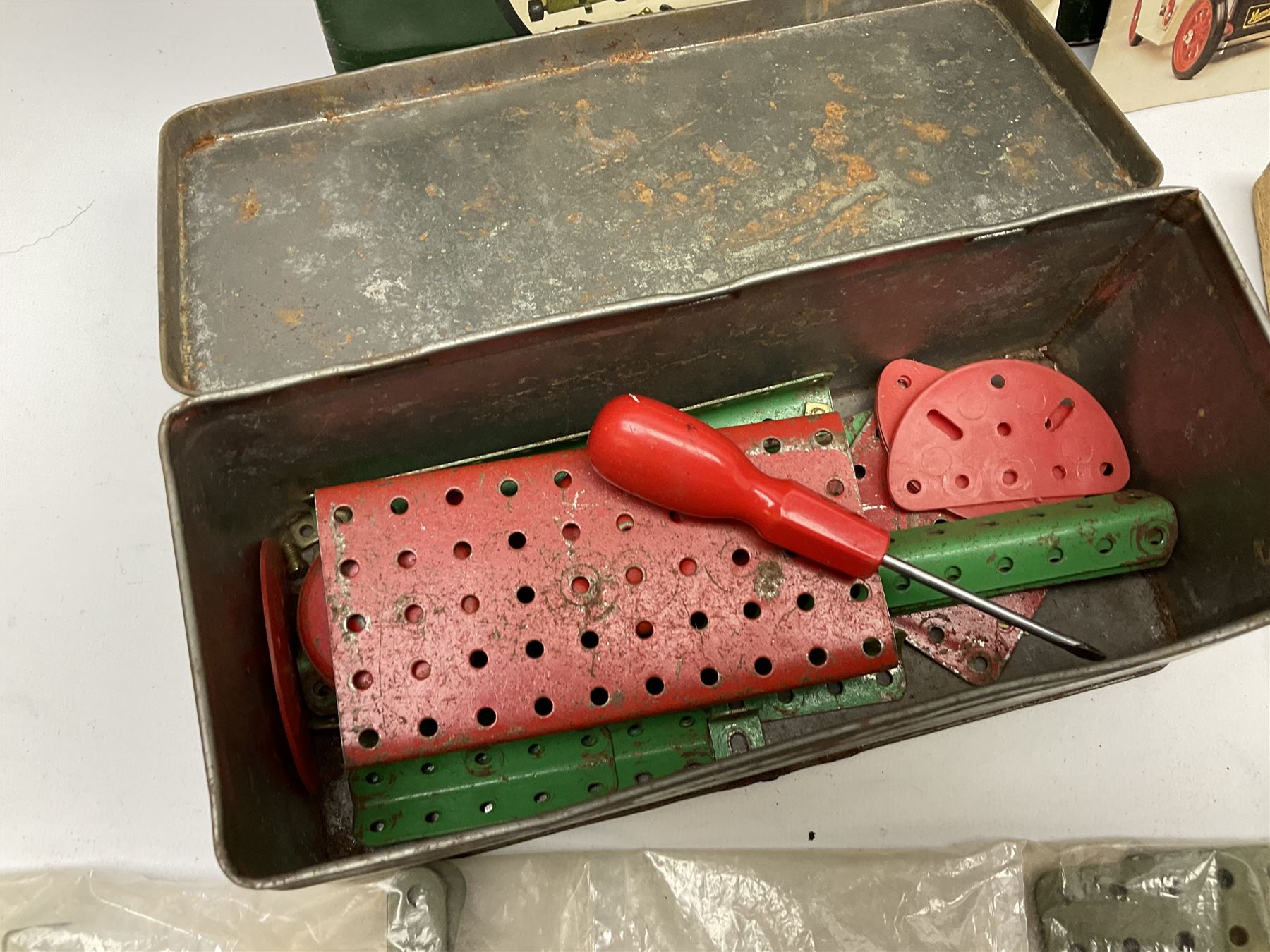 Mamod Minor 1 stationary live steam engine, line shaft, power hammer etc, attached to a wood board, with boxes and a quantity of Meccano 