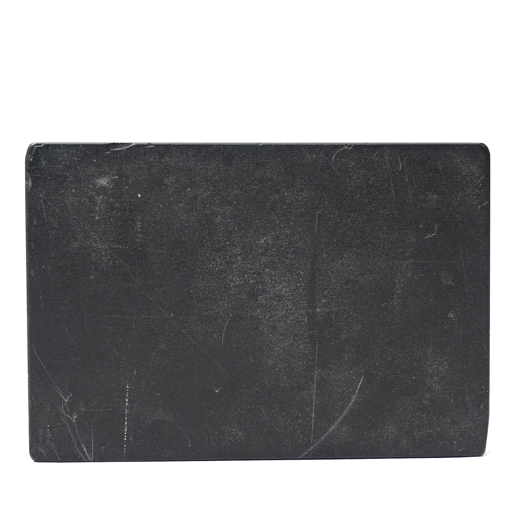 19th-century Italian Grand Tour micromosaic paperweight, the rectangular slab of polished Nero Belgio black marble inset with an oval micromosaic panel finely composed in minute tesserae, depicting a classical architectural view evocative of ancient Rome, centred by a triumphal column and flanked by monumental buildings, 14cm x 9.5cm