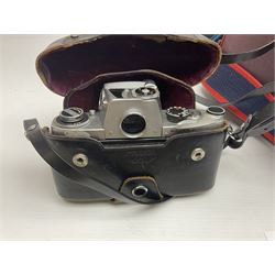 Cameras and accessories, to include Olympus OM101 Power Focus camera body, serial no 1076067, with 'Sigma AF Zoom 1:38, f=75 200mm' lens, serial no 2053714, Canon EOS 5000 camera body, serial no 1507812, with 'Canon Zoom EF 80-200mm, 1:4.5-5.6' lens, other cameras, by Miranda, Coronet and Ricoh and a collection of lenses, carry cases, etc 