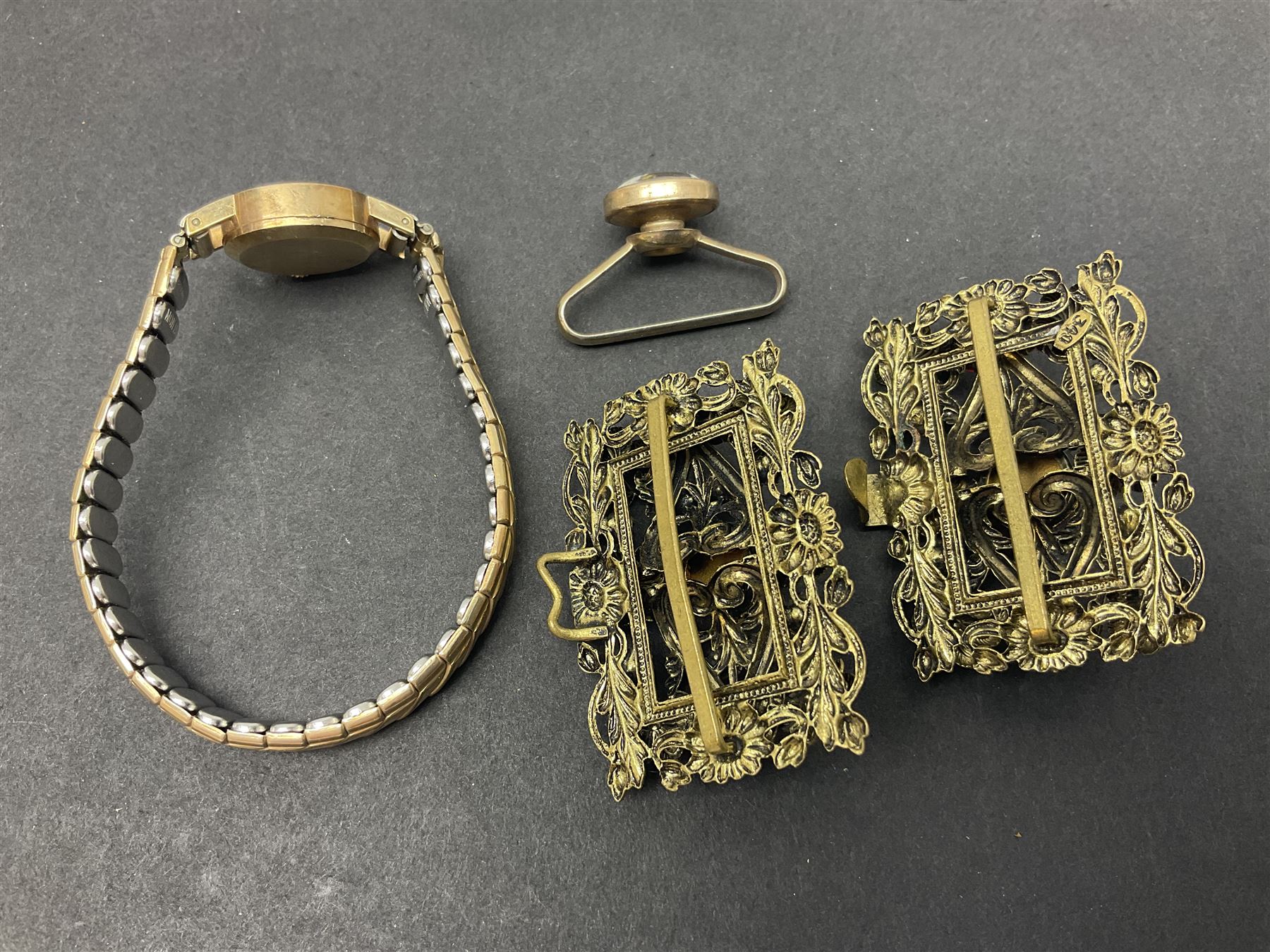 9ct gold jewellery including leaf brooch, wishbone Mizpah brooch, carnelian brooch, gold cased ladies Omega wristwatch, on leather strap and gold cased ladies Tissot wristwatch on expanding gilt strap, together with silver brooches and a Czech paste buckle, etc