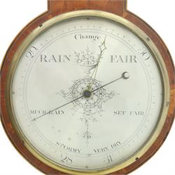 Three mahogany wheel barometers, each with silvered dial, thermometer and hygrometer, two with inlaid decoration, one with architectural pediment and one with swan-neck pediment 